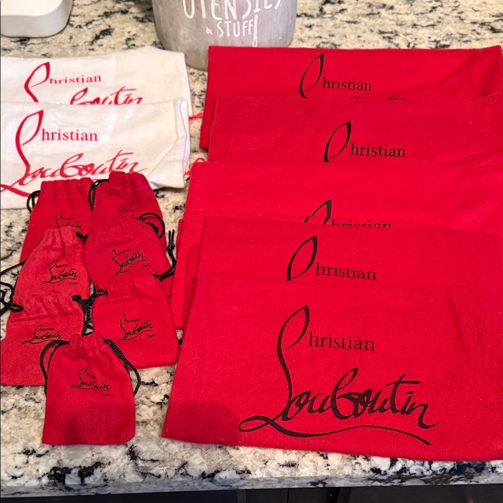 Christian Louboutin dust bags and heel taps bundle